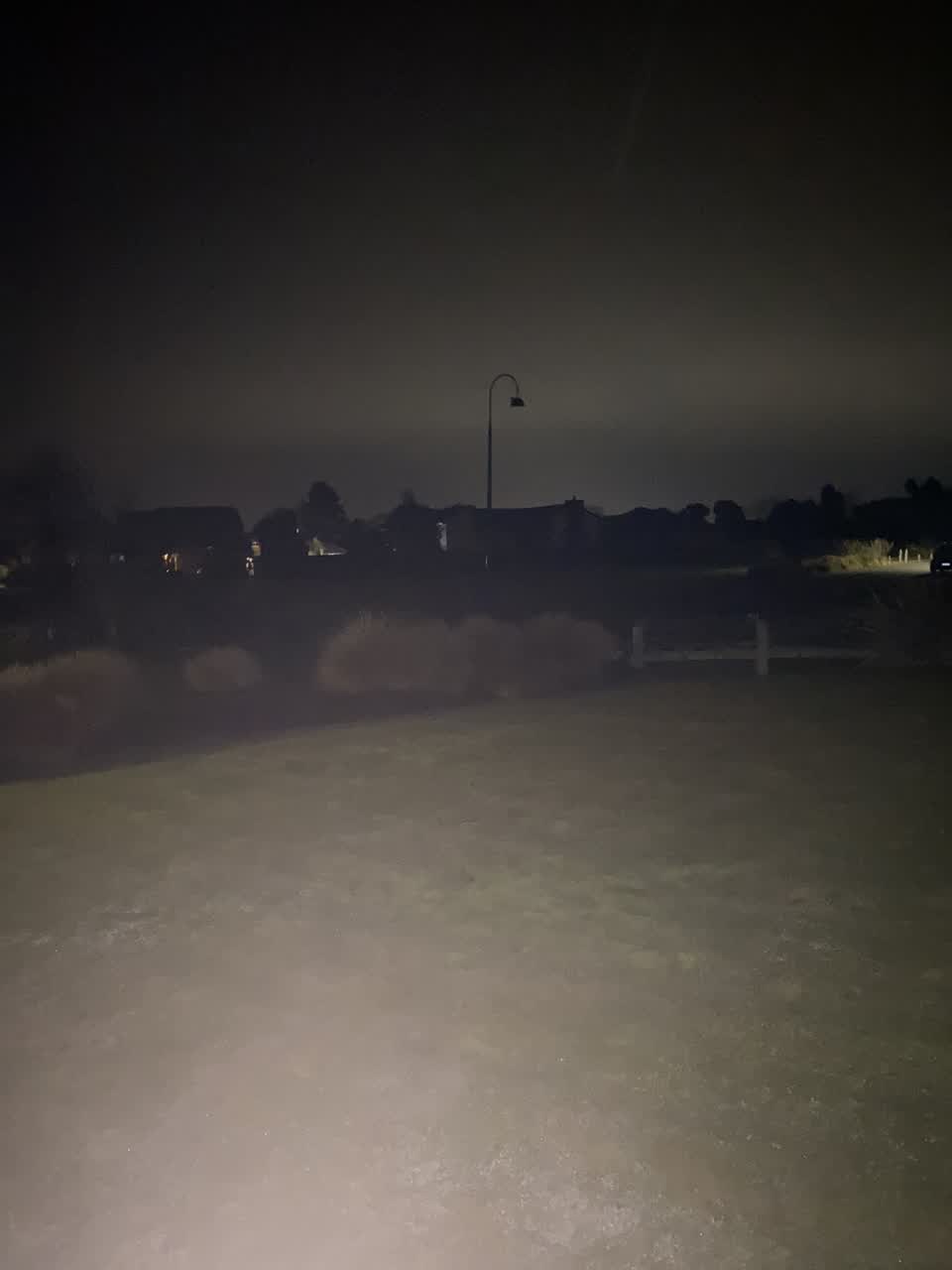 The photograph attached to this street light outage report