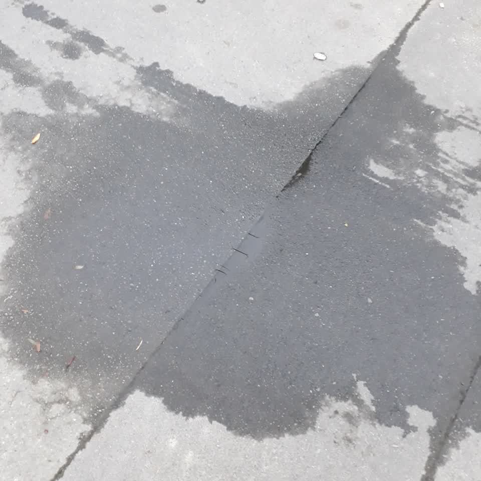The photograph attached to this water leak report