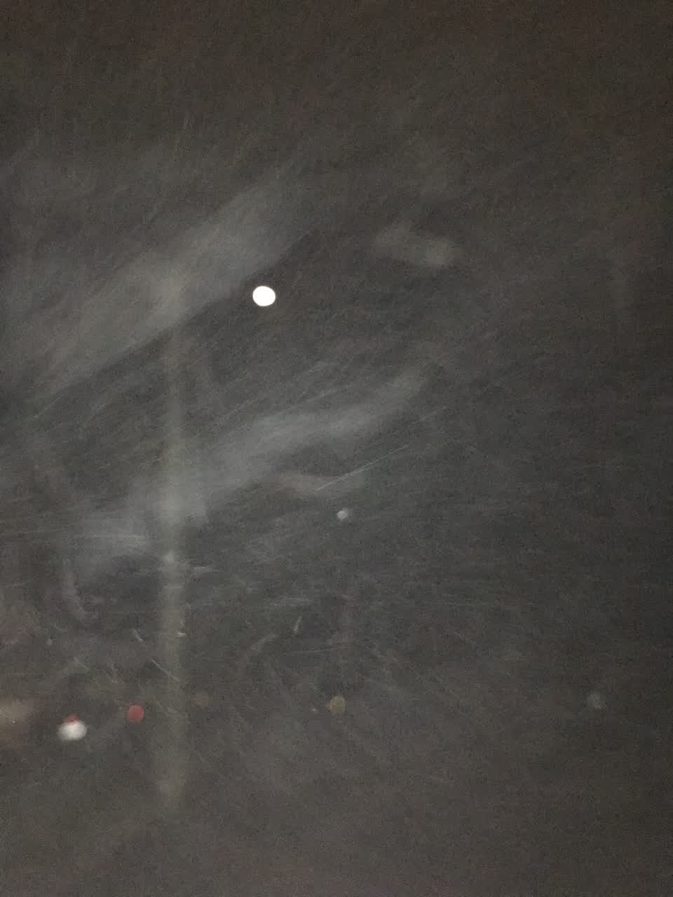 The photograph attached to this street light outage report