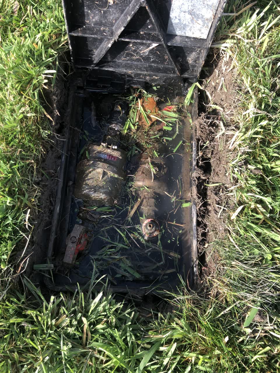 The photograph attached to this water leak report
