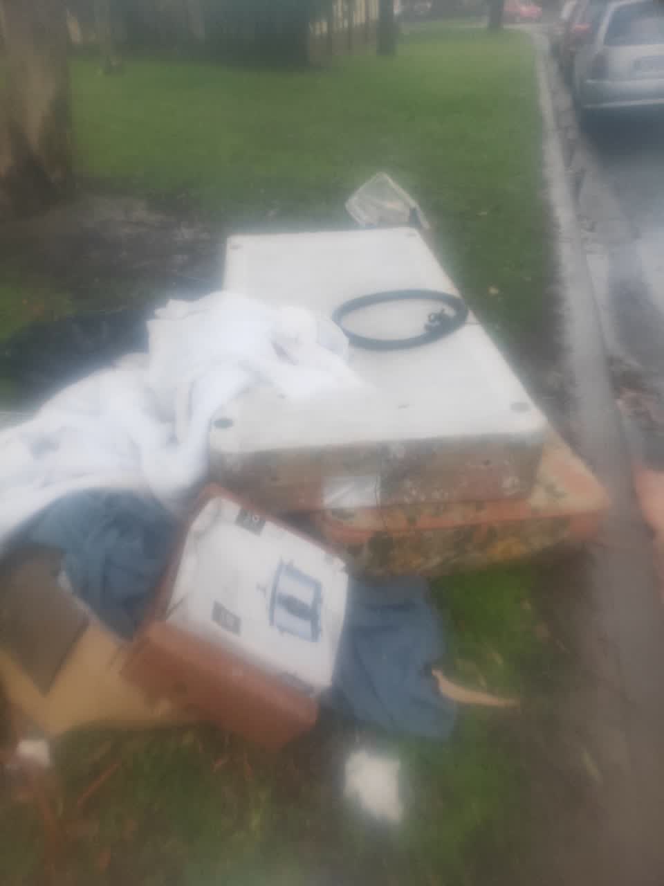 The photograph attached to this rubbish/recycling report