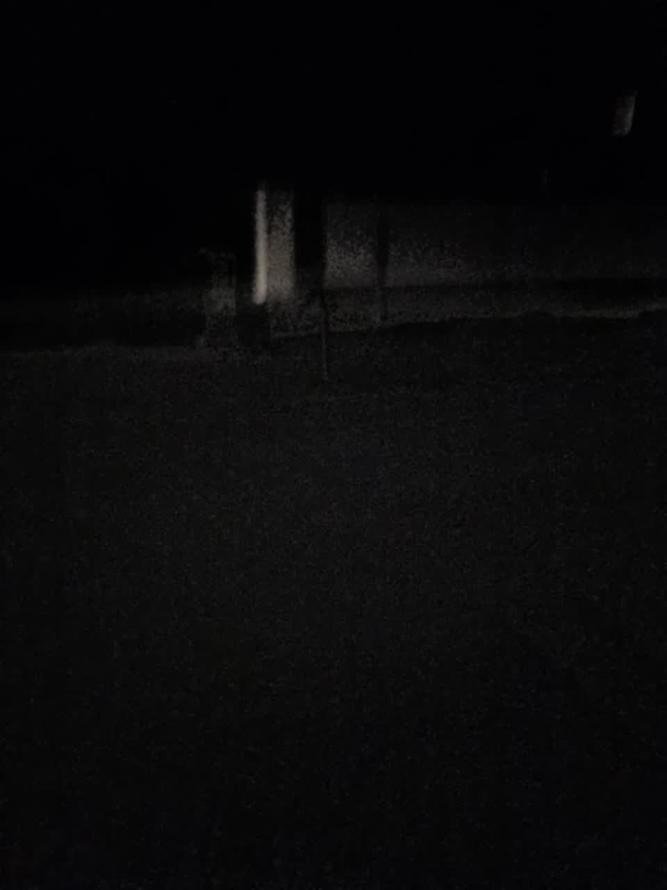 The photograph attached to this street light outage report