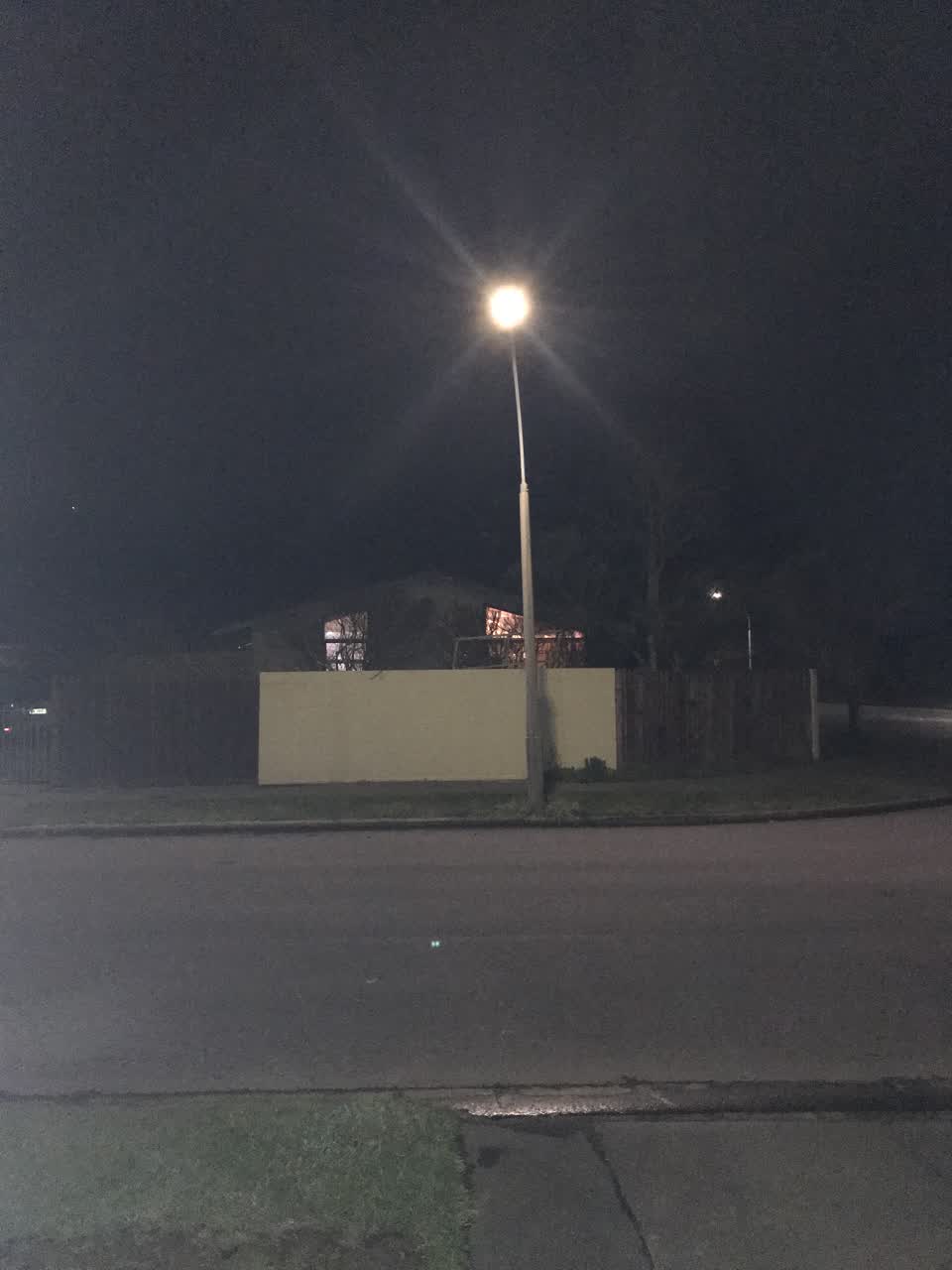 The photograph attached to this street light outage report