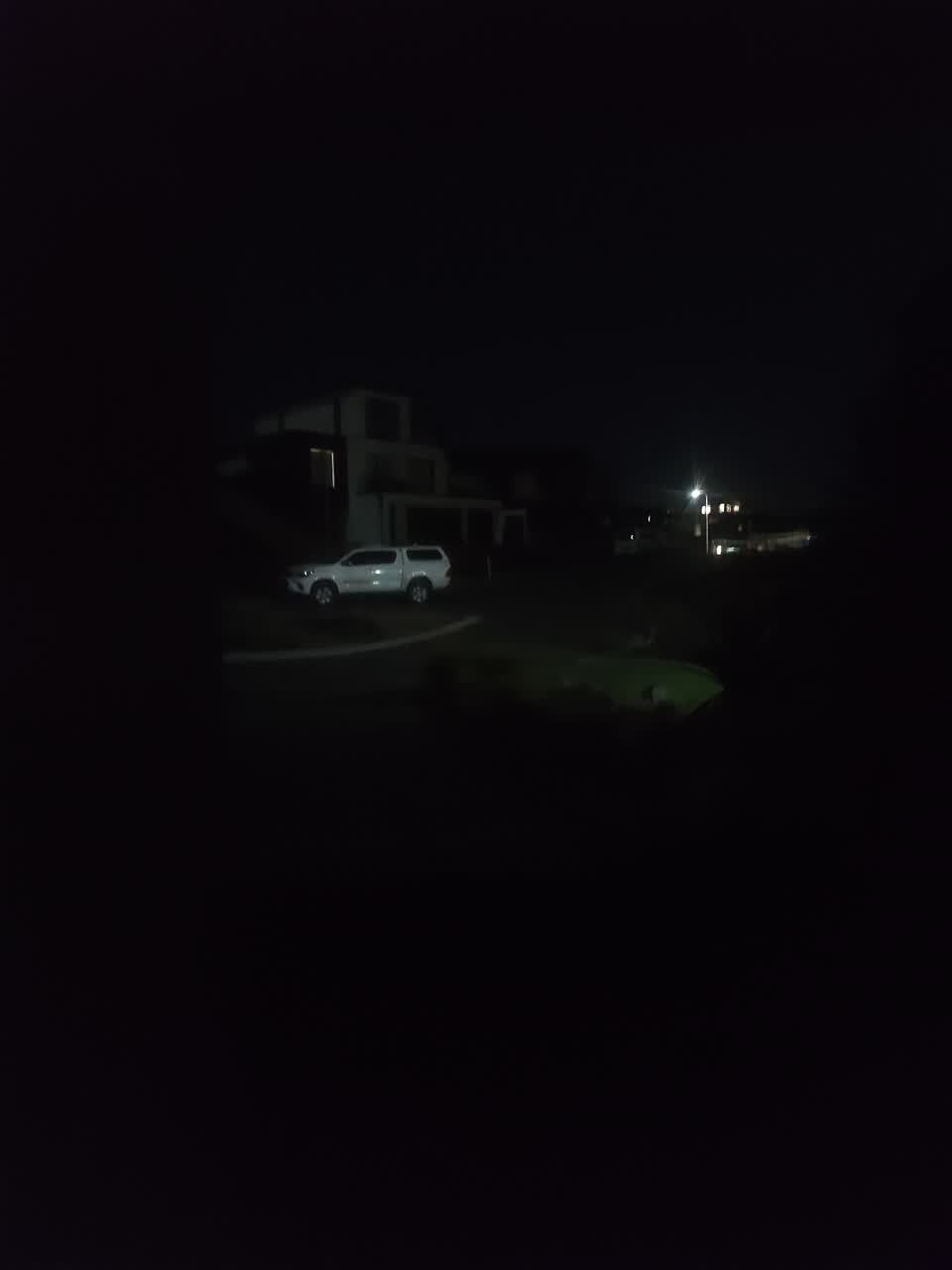 The photograph attached to this street light outage report