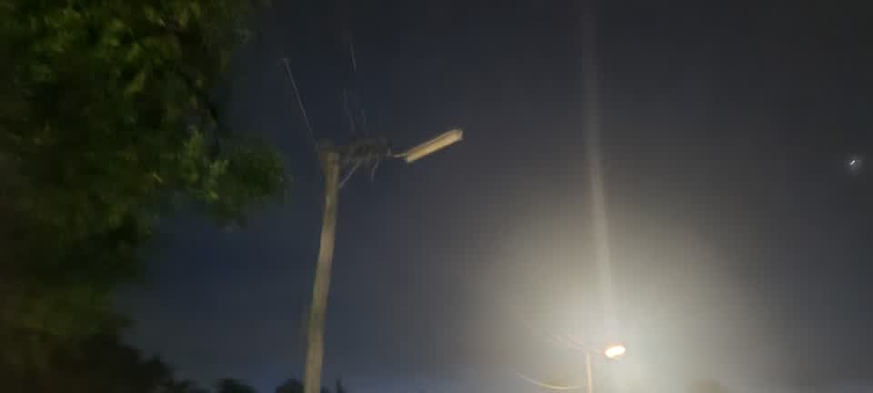 The photograph attached to this street light outage report