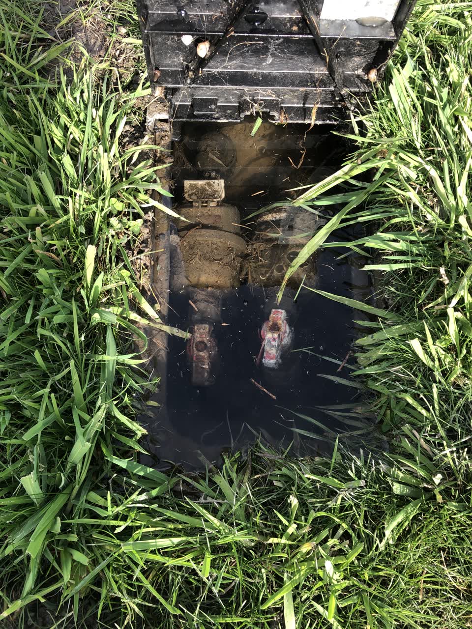 The photograph attached to this water leak report