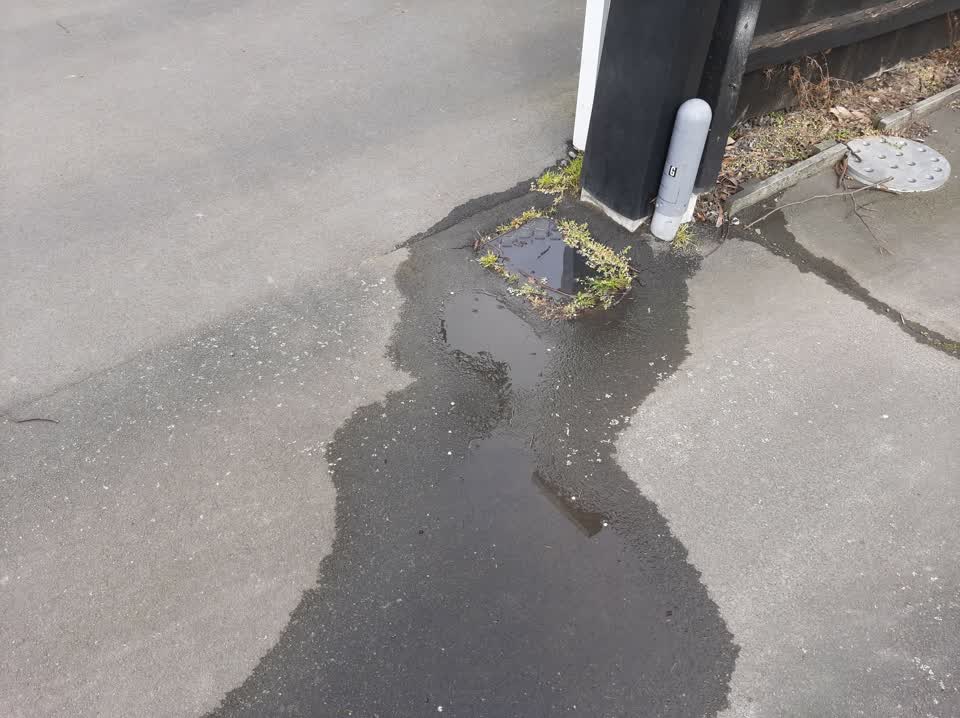 The photograph attached to this water leak report
