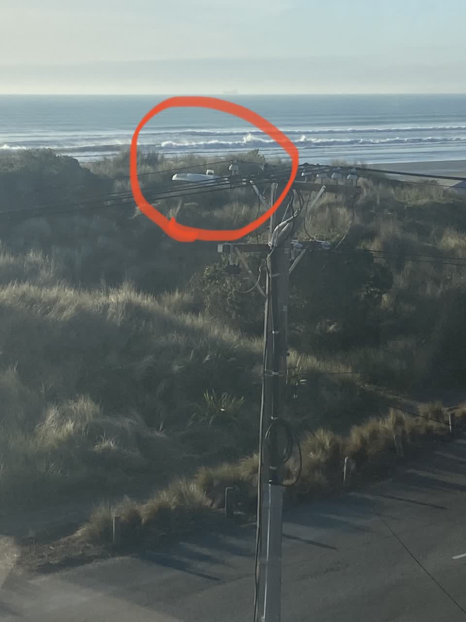 The photograph attached to this street light outage report