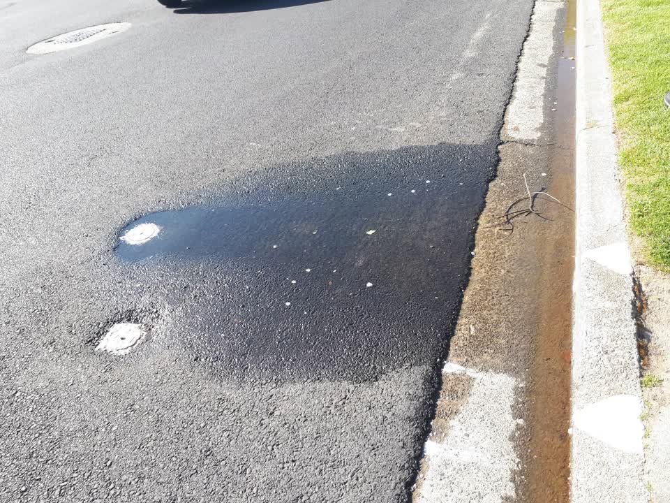 The photograph attached to this water leak report