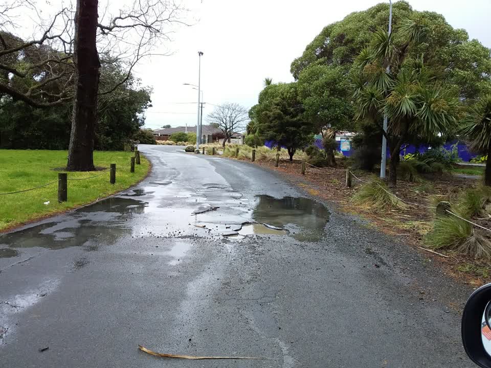 The photograph attached to this street light outage report