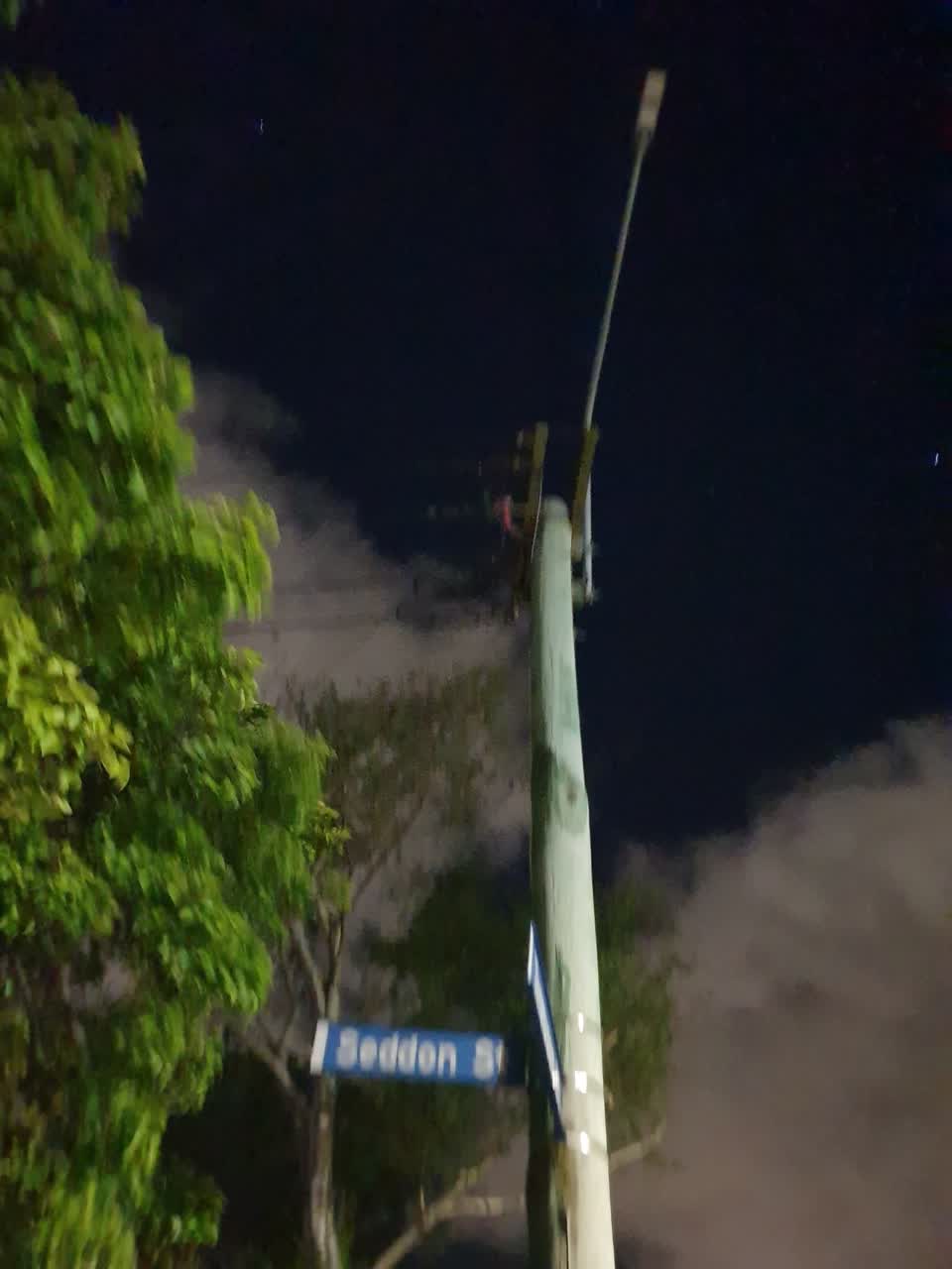 The photograph attached to this street light outage report