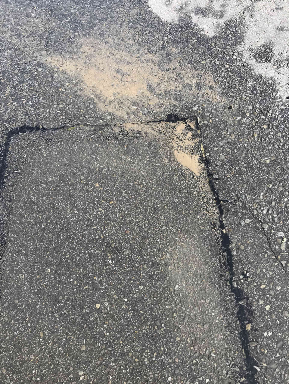 The photograph attached to this water leak report