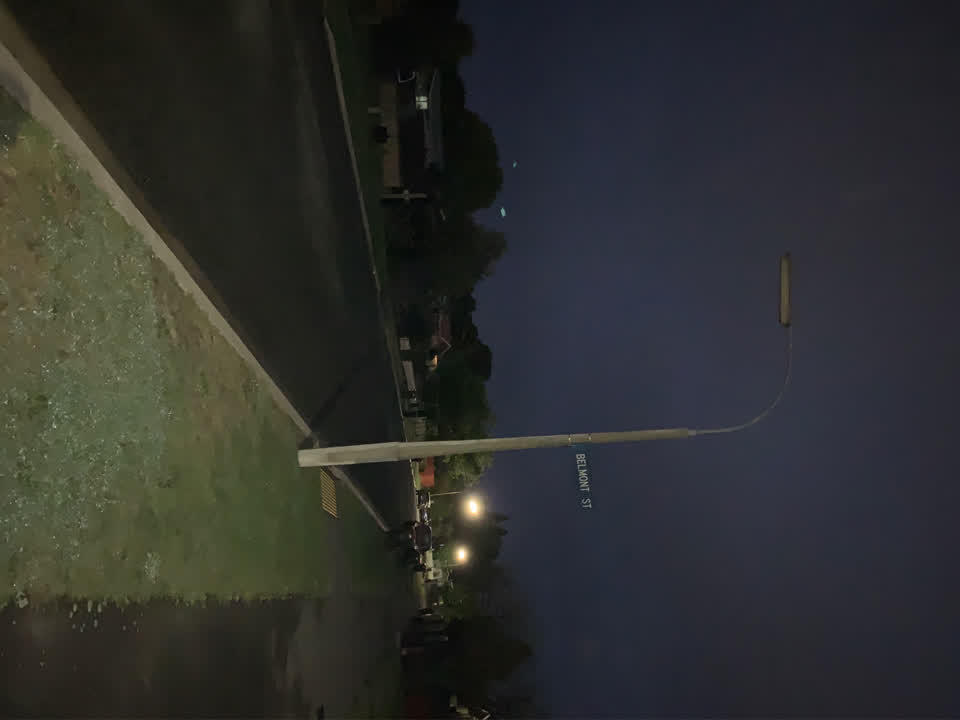The photograph attached to this street light outage report