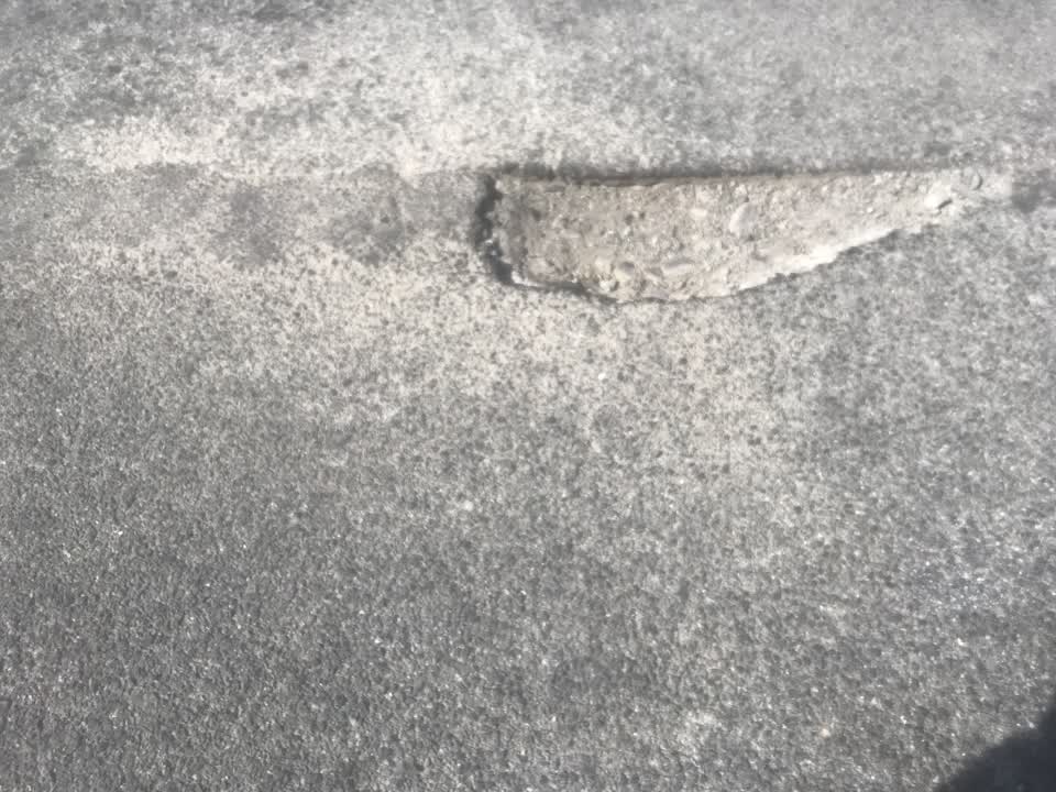 The photograph attached to this roading/streets report