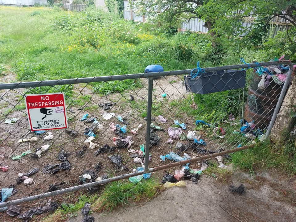 The photograph attached to this rubbish/recycling report