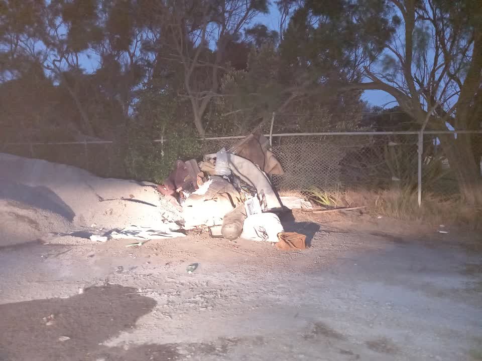 The photograph attached to this rubbish/recycling report