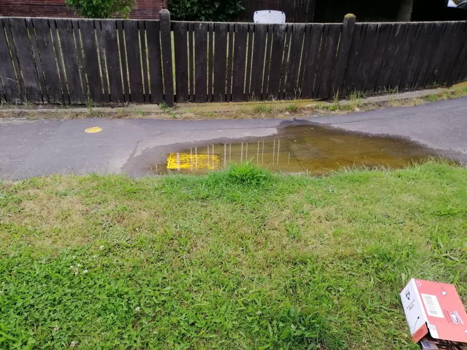 The photograph attached to this water leak report