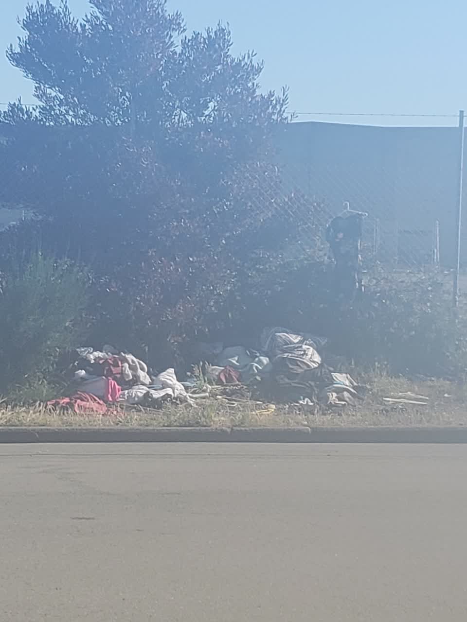 The photograph attached to this rubbish/recycling report