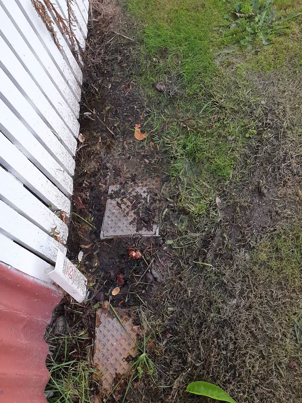 The photograph attached to this water leak report