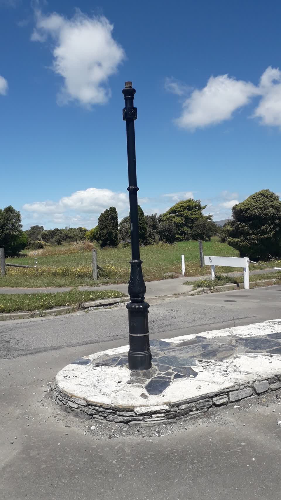 The photograph attached to this street light outage report