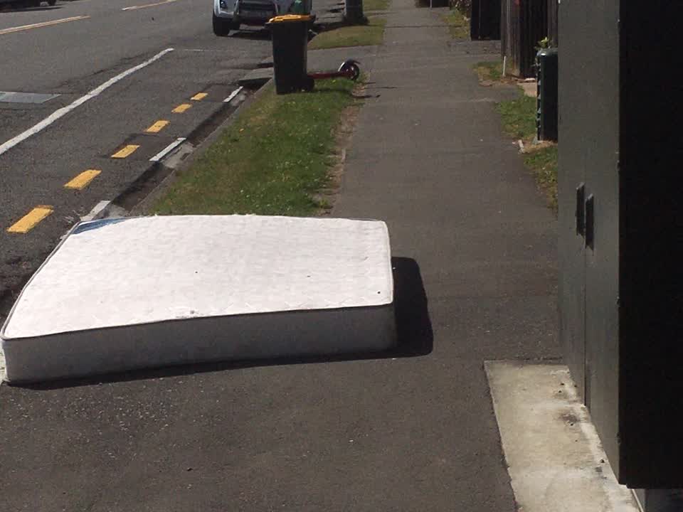 The photograph attached to this rubbish/recycling report