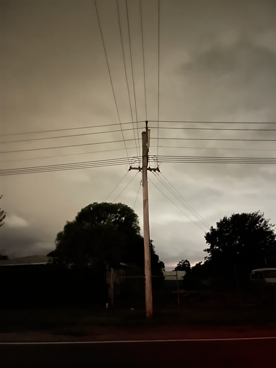 The photograph attached to this street light outage report