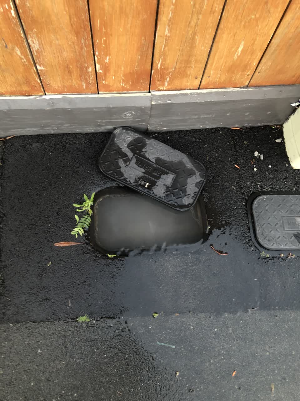 The photograph attached to this water leak report