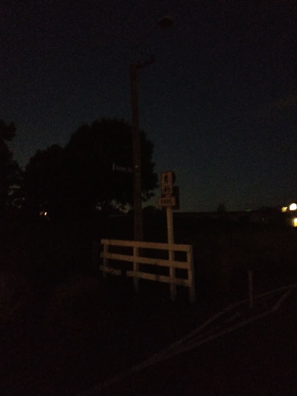 The photograph attached to this street light outage report