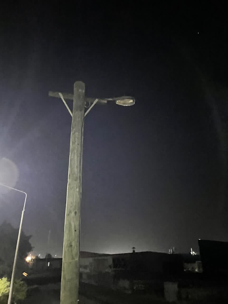 The photograph attached to this street light outage report
