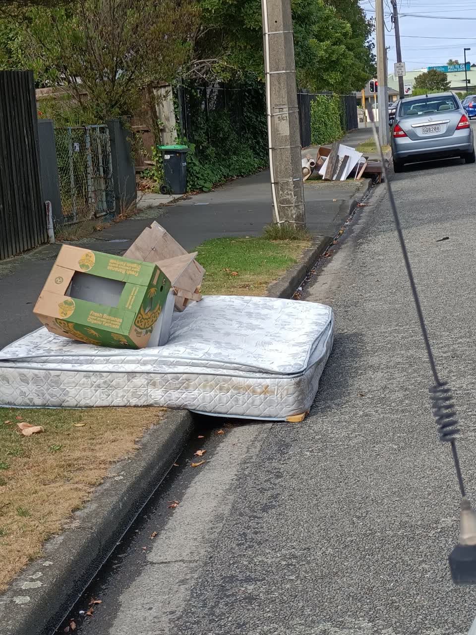 The photograph attached to this rubbish/recycling report
