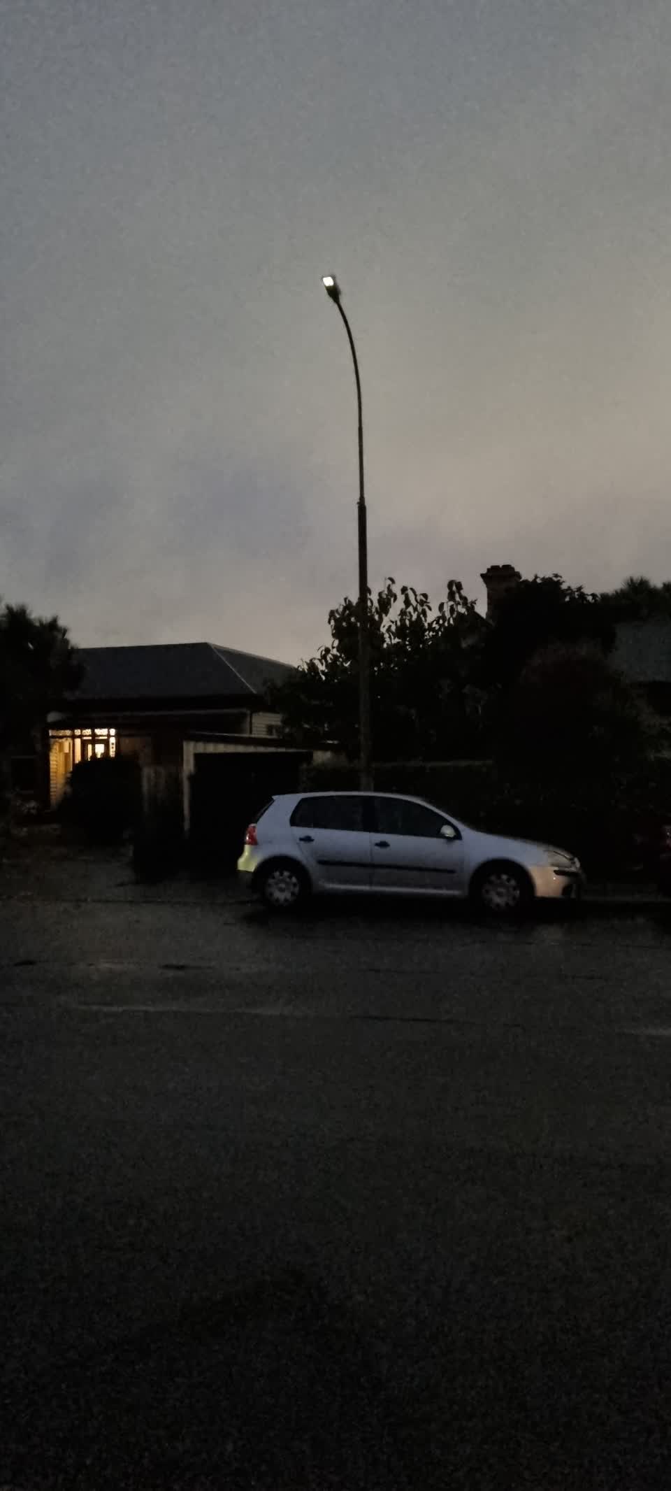 The photograph attached to this street light outage report