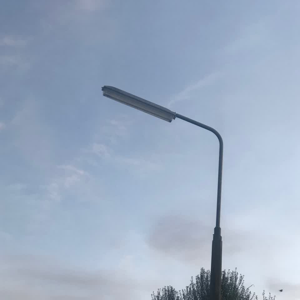 The photograph attached to this street light outage report