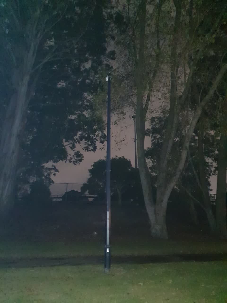 The photograph attached to this street light outage report