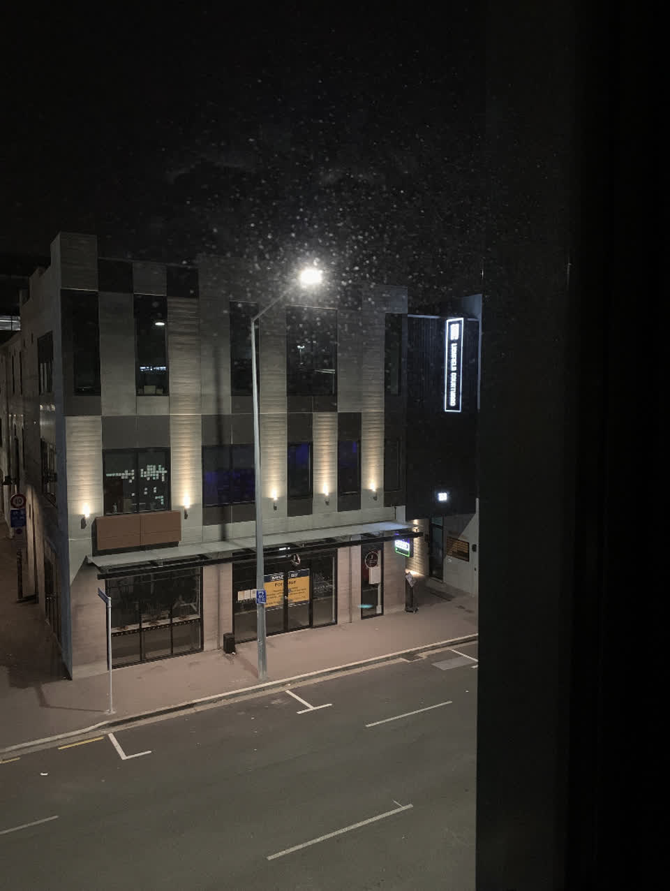 The photograph attached to this street light outage report