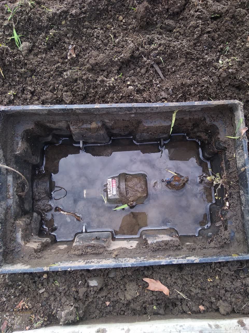 The photograph attached to this water leak report