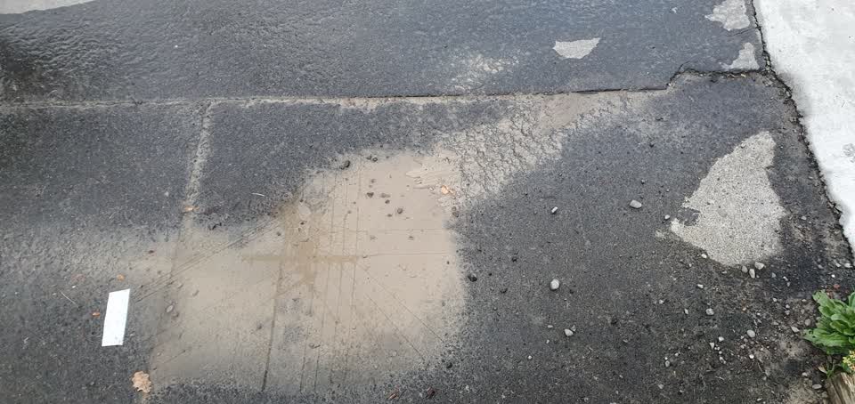 The photograph attached to this water leak report