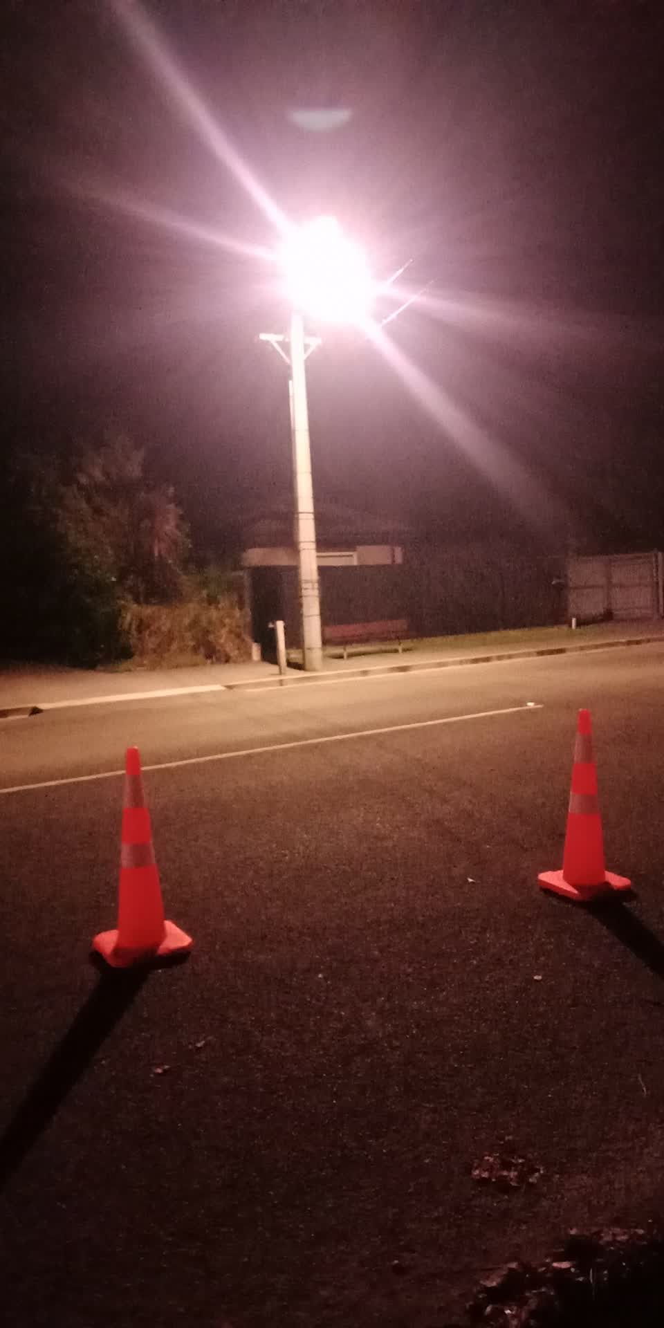 The photograph attached to this street light outage report