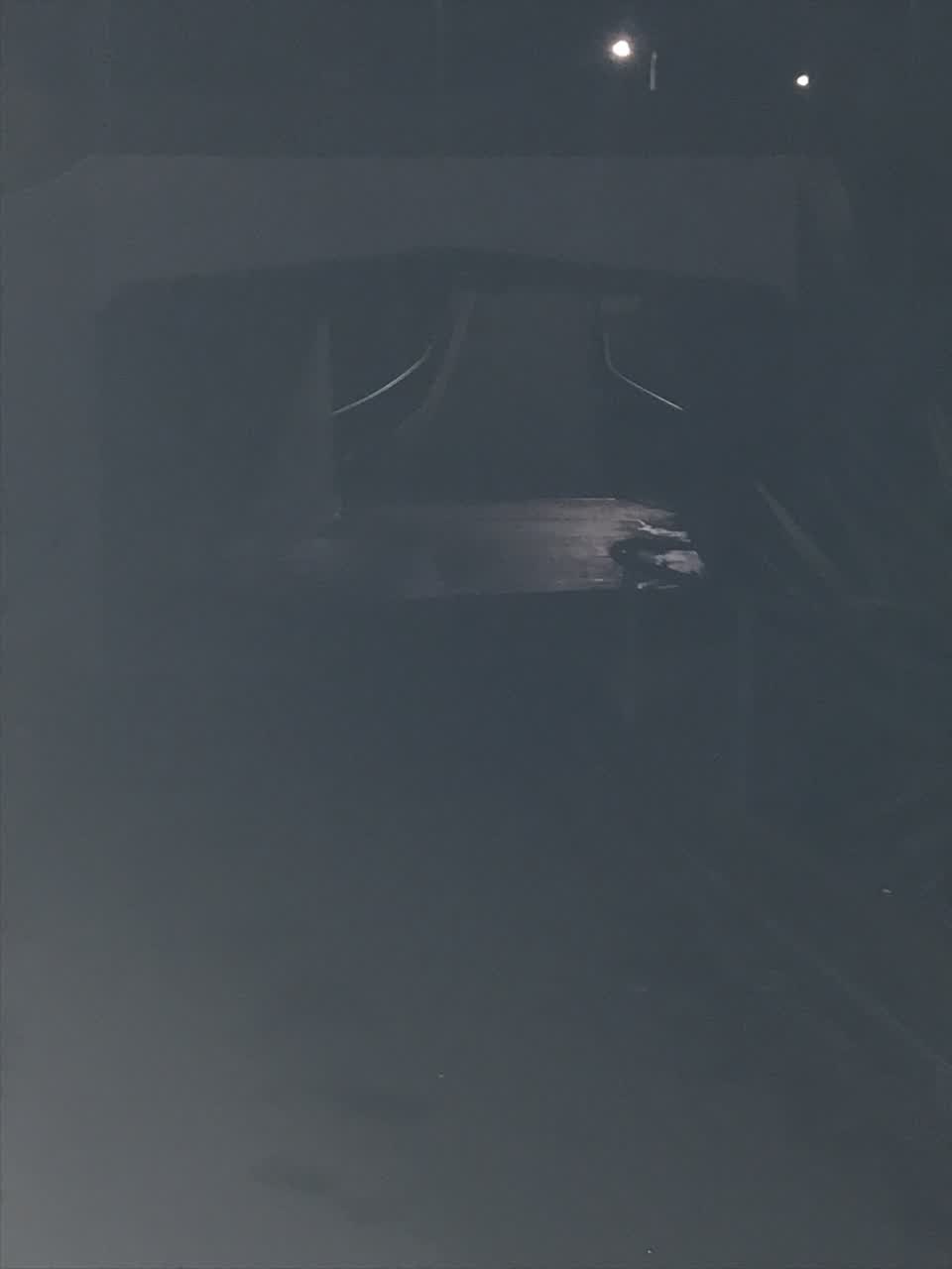 The photograph attached to this street light outage report