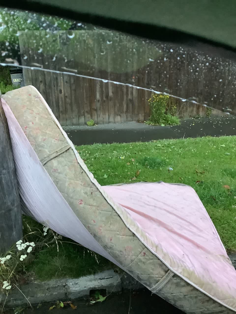 The photograph attached to this rubbish/recycling report