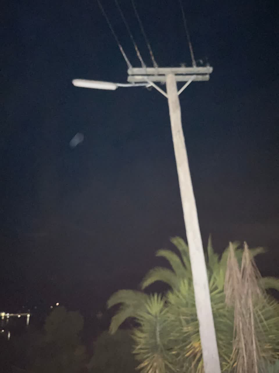 The photograph attached to this street light outage report
