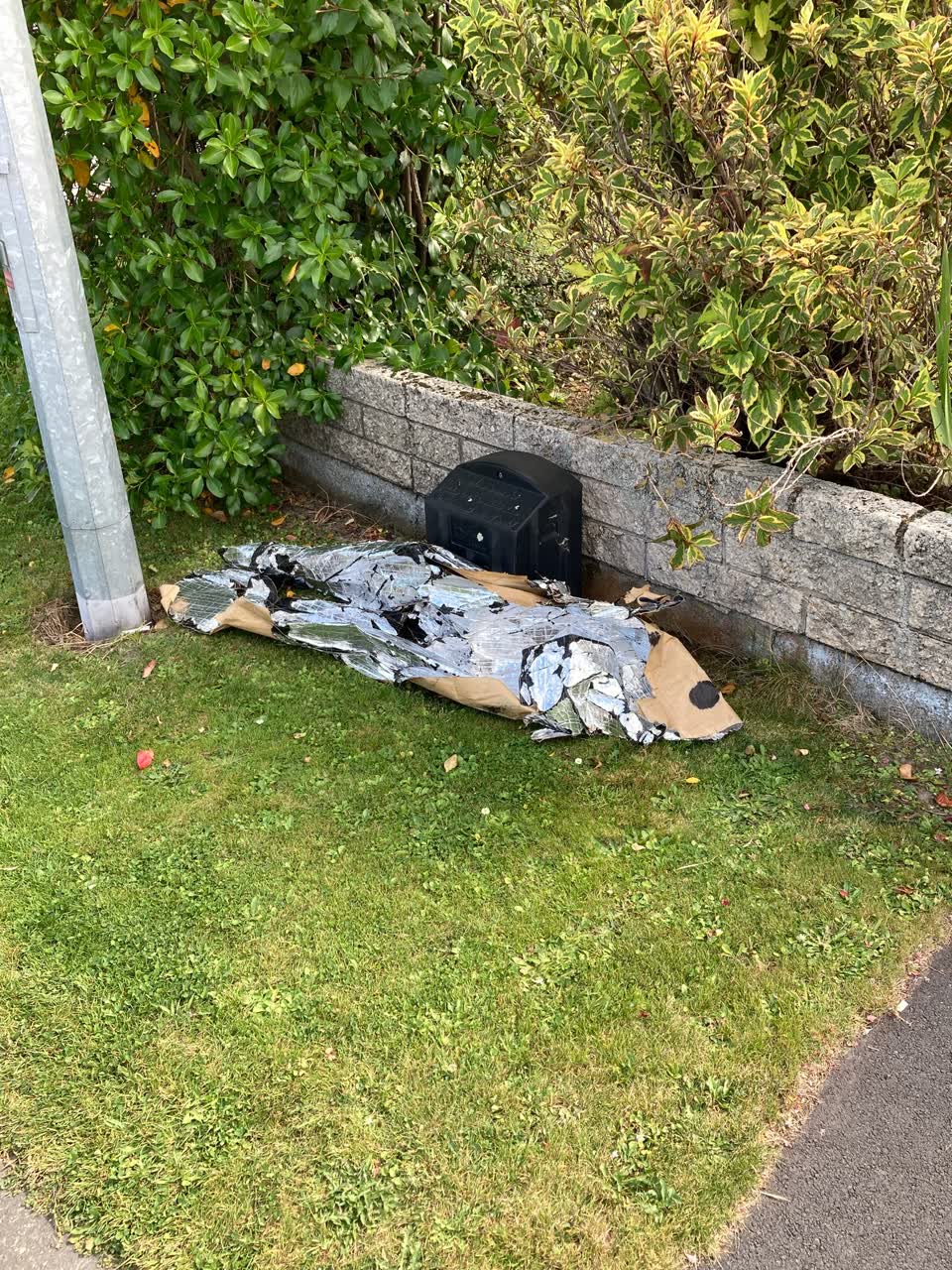 The photograph attached to this rubbish/recycling report