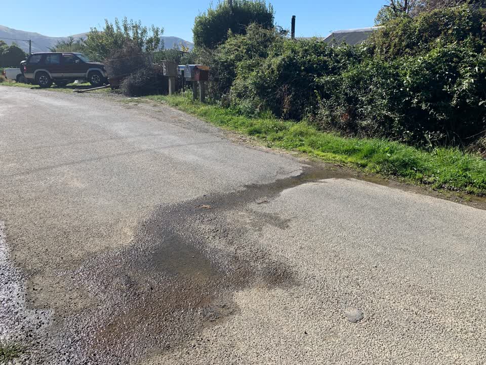 The photograph attached to this water leak report