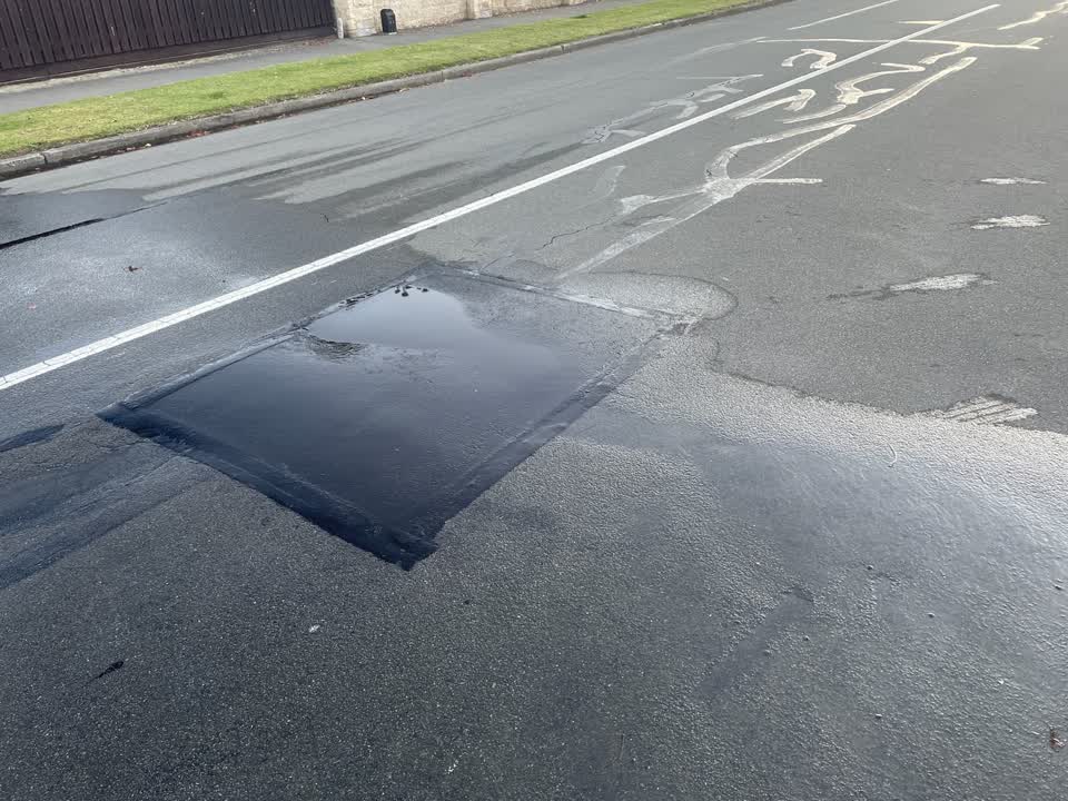 The photograph attached to this water leak report