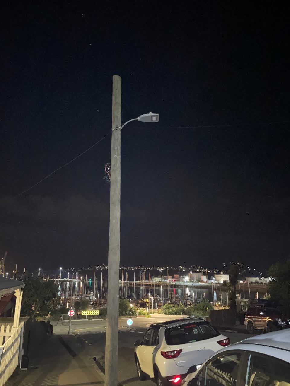 The photograph attached to this street light outage report