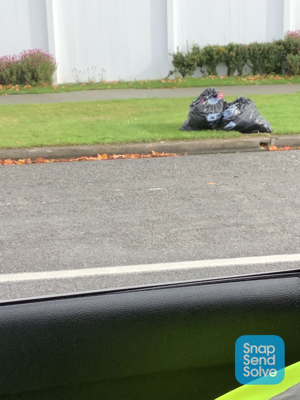 The photograph attached to this rubbish/recycling report