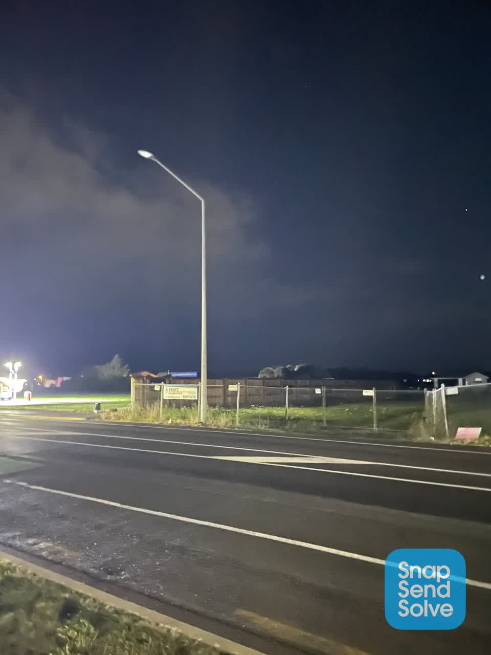 The photograph attached to this street light outage report