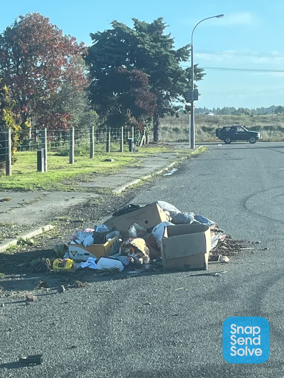 The photograph attached to this rubbish/recycling report