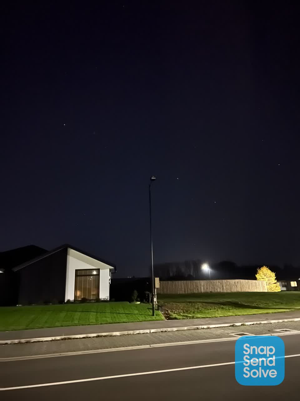 The photograph attached to this street light outage report