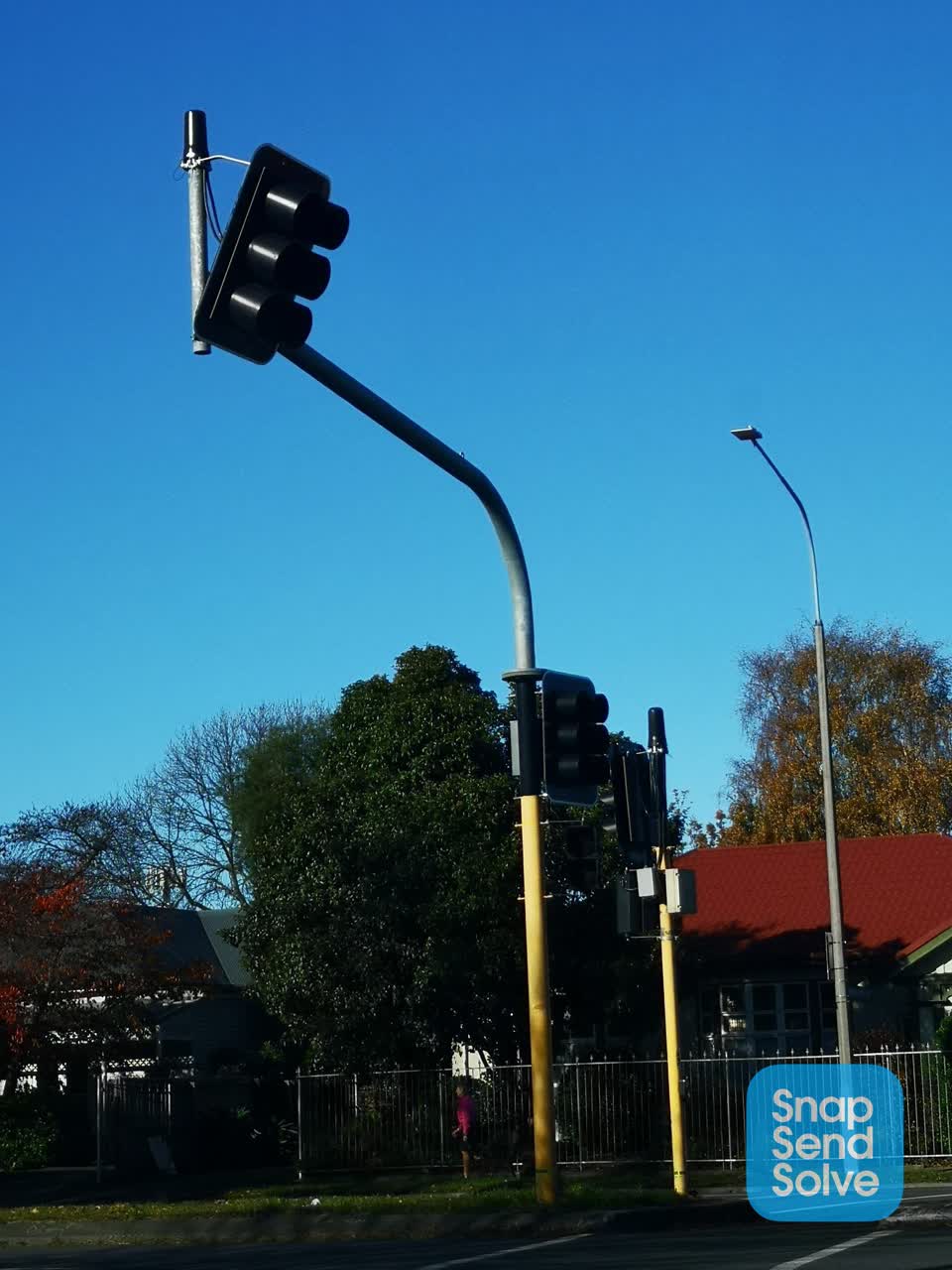 The photograph attached to this street light outage report