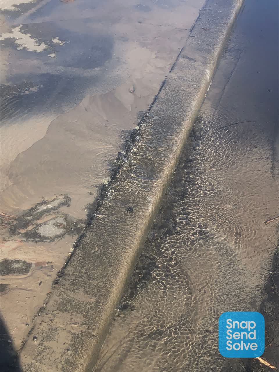 The photograph attached to this water leak report